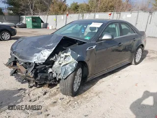 2012 Cadillac CTS Luxury z VIN 1G6DE5E51C0112608, wystawiony jako IAAI lot #41656992 z przebiegiem Nie podano mil oraz . Historia ofert i sprzedaży dostępna na DreamBid. Obrazek 17.