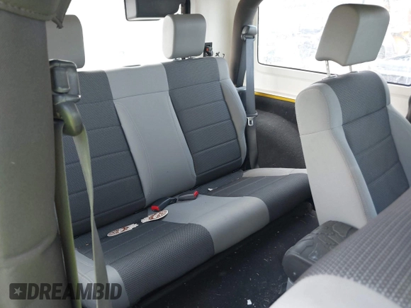 2008 Jeep Wrangler X with VIN 1J4FA24108L516904, listed as a IAAI auction lot 42548005 with 145,439 mi miles and . Bid and sale history available at DreamBid. Image 8.