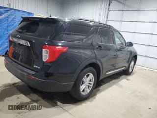 2022 Ford Explorer XLT z VIN 1FMSK8DH0NGB21901, wystawiony jako Copart lot #57749845 z przebiegiem 21 666 mil mil oraz Szkoda całkowita • Salvage title. Historia ofert i sprzedaży dostępna na DreamBid. Obrazek 3.