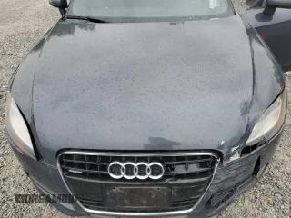 2009 Audi TT Prestige z VIN TRUVD38J591003496, wystawiony jako Copart lot #54009445 z przebiegiem 103 747 mil mil oraz Szkody całkowita. Historia ofert i sprzedaży dostępna na DreamBid. Obrazek 11.
