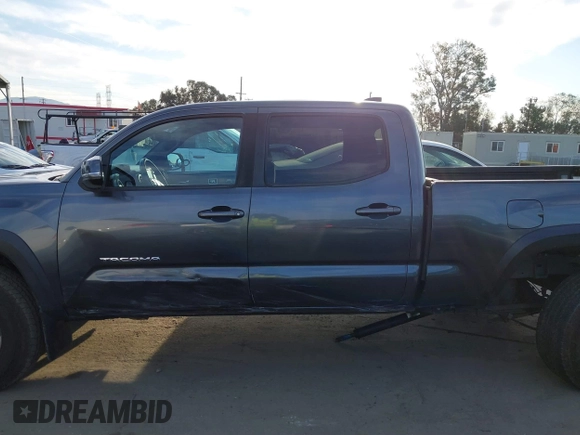 2021 Toyota Tacoma SR5 z VIN 3TMDZ5BN6MM110938, wystawiony jako IAAI lot #41838703 z przebiegiem 67 680 mil mil oraz . Historia ofert i sprzedaży dostępna na DreamBid. Obrazek 14.