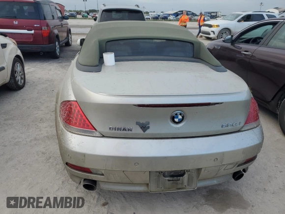 2006 BMW 6 Series 650Ci z VIN WBAEK13466CN72361, wystawiony jako Copart lot #74586414 z przebiegiem Nie podano mil oraz Szkoda całkowita • Salvage title. Historia ofert i sprzedaży dostępna na DreamBid. Obrazek 6.