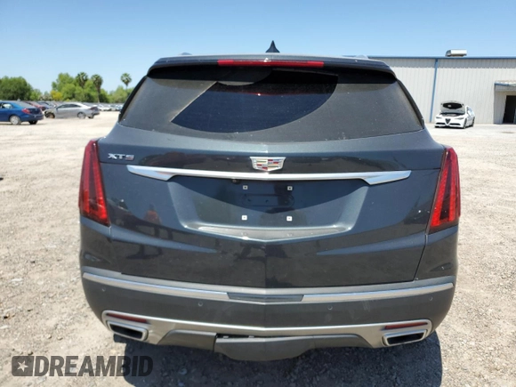 2023 Cadillac XT5 FWD Premium Luxury z VIN 1GYKNCRS0PZ173923, wystawiony jako Copart lot #52212695 z przebiegiem Nie podano mil oraz Szkoda całkowita • Salvage title. Historia ofert i sprzedaży dostępna na DreamBid. Obrazek 6.