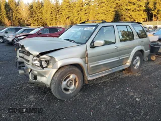 1998 Infiniti QX4 with VIN JNRAR05Y2WW033418, listed as a Copart auction lot 83199844 with 227,176 mi miles and Salvage Title. Bid and sale history available at DreamBid. Image 1.