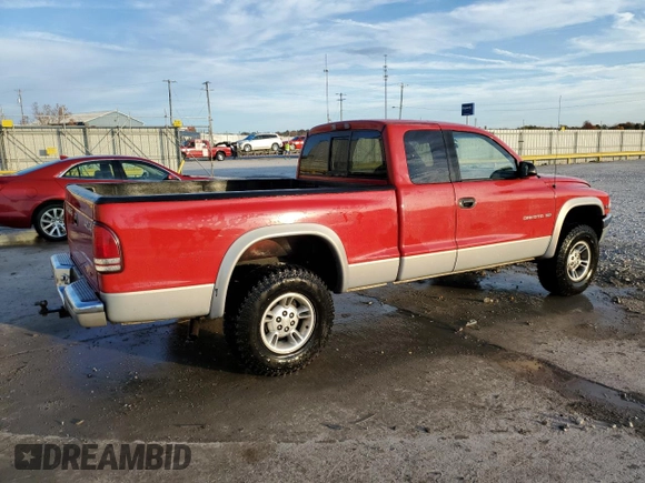 1997 Dodge Dakota z VIN 1B7GG23X0VS187346, wystawiony jako Copart lot #79128194 z przebiegiem 116 778 mil mil oraz Szkoda całkowita • Salvage title. Historia ofert i sprzedaży dostępna na DreamBid. Obrazek 3.