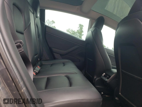 2020 Tesla Model 3 Long Range z VIN 5YJ3E1EB7LF710646, wystawiony jako Copart lot #57403355 z przebiegiem 98 080 mil mil oraz Szkoda całkowita • Salvage title. Historia ofert i sprzedaży dostępna na DreamBid. Obrazek 10.