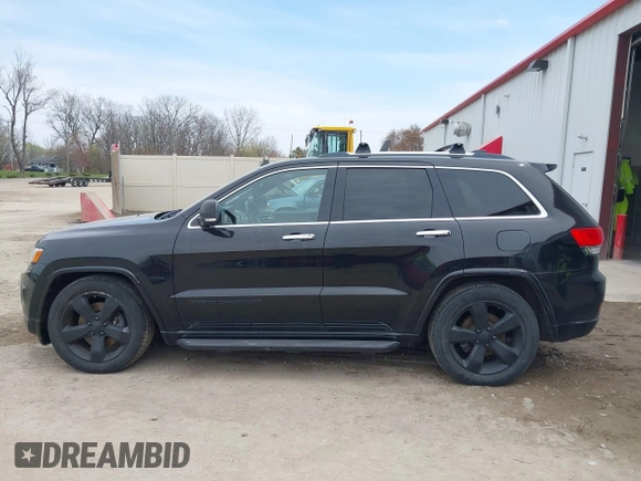 2014 Jeep Grand Cherokee Overland with VIN 1C4RJFCM8EC486259, listed as a IAAI auction lot 42105296 with 129,342 mi miles. Bid and sale history available at carsss.com. Image 14.