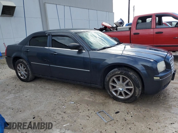 2007 Chrysler 300 Limited with VIN 2C3KK53G97H771740, listed as a Copart auction lot 79426564 with 132,823 mi miles and Salvage Title. Bid and sale history available at carsss.com. Image 4.