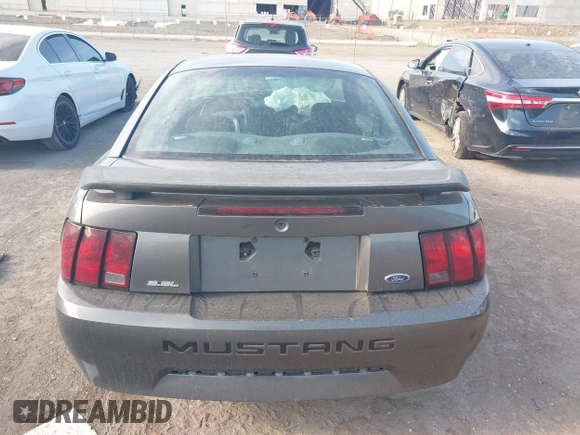 2003 Ford Mustang Standard z VIN 1FAFP40463F341216, wystawiony jako IAAI lot #42601357 z przebiegiem 145 520 mil mil oraz . Historia ofert i sprzedaży dostępna na DreamBid. Obrazek 16.