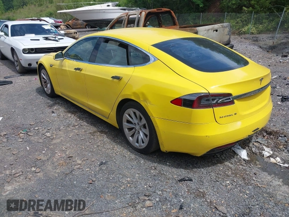 2016 Tesla Model S 70 kWh Battery with VIN 5YJSA1E14GF141579, listed as a IAAI auction lot 42209119 with 105,947 mi miles and . Bid and sale history available at carsss.com. Image 3.