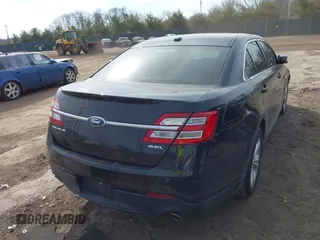 2013 Ford Taurus SEL with VIN 1FAHP2E84DG188503, listed as a IAAI auction lot 41800277 with 215,015 mi miles. Bid and sale history available at carsss.com. Image 4.