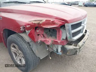 2010 Dodge Dakota with VIN 1D7CE3GP0AS166078, listed as a IAAI auction lot 41856634 with 235,615 mi miles and . Bid and sale history available at DreamBid. Image 6.