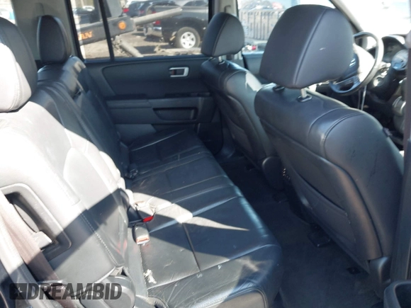 2015 Honda Pilot Touring with VIN 5FNYF3H97FB016390, listed as a IAAI auction lot 41753590 with 217,156 mi miles. Bid and sale history available at carsss.com. Image 8.