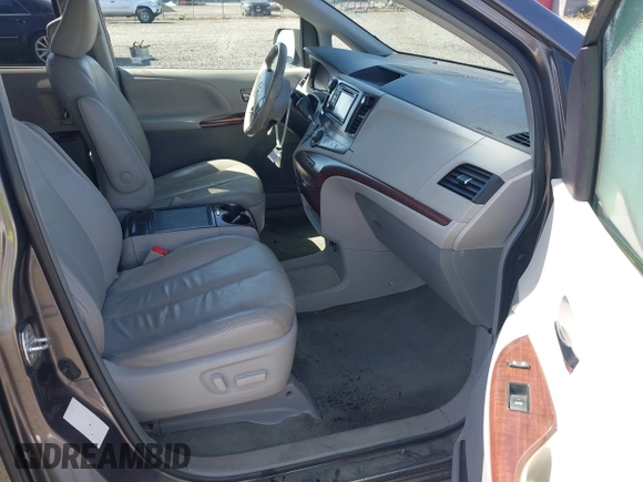 2014 Toyota Sienna XLE with VIN 5TDYK3DC5ES451965, listed as a IAAI auction lot 41879334 with 145,114 mi miles and . Bid and sale history available at DreamBid. Image 5.