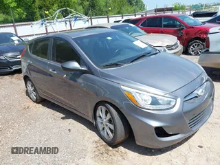 2014 Hyundai Accent SE z VIN KMHCU5AE5EU152313, wystawiony jako IAAI lot #42522193 z przebiegiem 146 152 mil mil oraz . Historia ofert i sprzedaży dostępna na DreamBid. Obrazek 1.