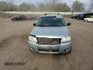 2005 Mercury Mariner Luxury with VIN 4M2YU57115DJ23819, listed as a Copart auction lot 54370265 with 215,657 mi miles and Clean title. Bid and sale history available at DreamBid. Image 14.