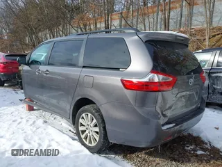 2017 Toyota Sienna LE with VIN 5TDJZ3DC5HS173134, listed as a IAAI auction lot 41256534 with 70,940 mi miles. Bid and sale history available at carsss.com. Image 3.