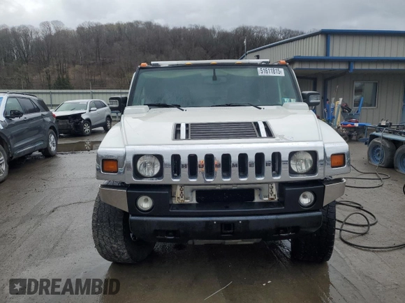 2006 Hummer H2 z VIN 5GRGN23UX6H104613, wystawiony jako Copart lot #51611815 z przebiegiem 186 543 mil mil oraz Szkody całkowita. Historia ofert i sprzedaży dostępna na DreamBid. Obrazek 5.