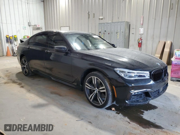 2016 BMW 7 Series 750i with VIN WBA7F0C5XGGL99017, listed as a Copart auction lot 84934504 with 0 mi miles and Salvage Title. Bid and sale history available at carsss.com. Image 4.