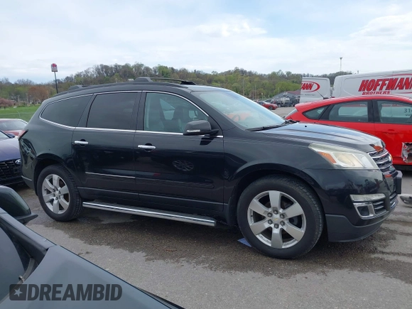 2014 Chevrolet Traverse LTZ with VIN 1GNKRJKD1EJ203282, listed as a IAAI auction lot 41984380 with 219,819 mi miles and . Bid and sale history available at DreamBid. Image 13.