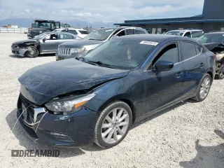 2017 Mazda 3 Touring with VIN 3MZBN1V75HM137947, listed as a Copart auction lot 58838515 with 91,617 mi miles and Salvage title. Bid and sale history available at DreamBid. Image 1.
