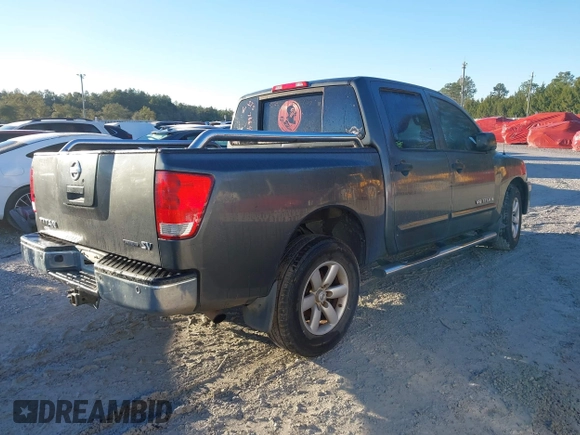 2011 Nissan Titan SV with VIN 1N6BA0ED1BN323008, listed as a IAAI auction lot 41307664 with 161,411 mi miles and . Bid and sale history available at DreamBid. Image 4.