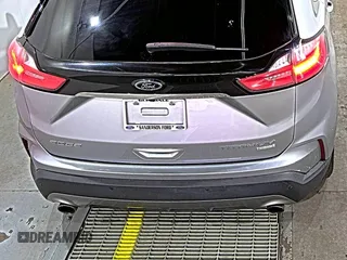2020 Ford Edge Titanium with VIN 2FMPK3K95LBA30678, listed as a IAAI auction lot 42714178 with 60,935 mi miles and . Bid and sale history available at DreamBid. Image 14.
