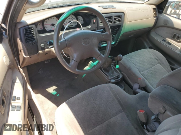 2003 Toyota Tacoma z VIN 5TEVL52N23Z253151, wystawiony jako Copart lot #58293555 z przebiegiem 266 250 mil mil oraz Szkoda całkowita • Salvage title. Historia ofert i sprzedaży dostępna na DreamBid. Obrazek 8.
