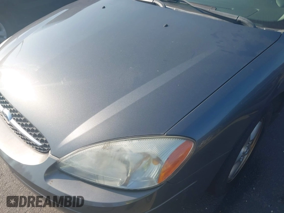 2002 Ford Taurus SES Standard z VIN 1FAFP55U22A172533, wystawiony jako IAAI lot #42680611 z przebiegiem 122 306 mil mil oraz . Historia ofert i sprzedaży dostępna na DreamBid. Obrazek 6.