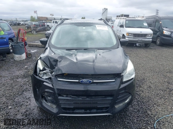 2015 Ford Escape SE with VIN 1FMCU9G98FUA26059, listed as a IAAI auction lot 41991222 with 149,298 mi miles and . Bid and sale history available at DreamBid. Image 13.