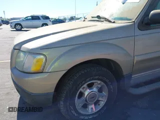 2004 Ford Explorer Sport Trac XLS z VIN 1FMZU67K24UA66100, wystawiony jako IAAI lot #42035953 z przebiegiem 217 105 mil mil oraz . Historia ofert i sprzedaży dostępna na DreamBid. Obrazek 6.
