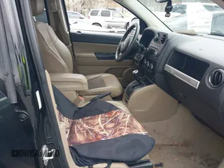 2014 Jeep Compass Sport with VIN 1C4NJCBA9ED823228, listed as a IAAI auction lot 41714992 with 168,996 mi miles. Bid and sale history available at carsss.com. Image 5.