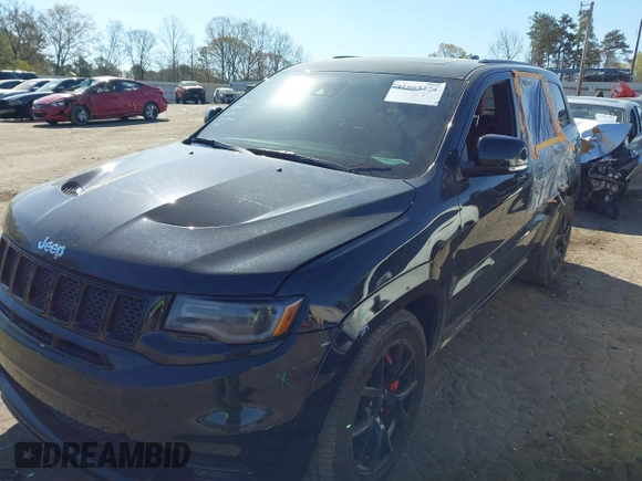 2017 Jeep Grand Cherokee SRT with VIN 1C4RJFDJ2HC696025, listed as a IAAI auction lot 41863274 with 126,949 mi miles. Bid and sale history available at carsss.com. Image 17.