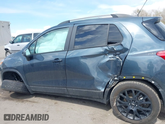 2022 Chevrolet Trax LT with VIN KL7CJPSM0NB528858, listed as a IAAI auction lot 41949198 with 48,810 mi miles and . Bid and sale history available at carsss.com. Image 6.