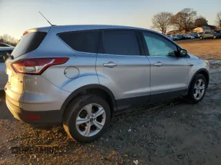 2014 Ford Escape SE with VIN 1FMCU0GX1EUC11059, listed as a Copart auction lot 88116175 with 94,001 mi miles and Salvage Title. Bid and sale history available at carsss.com. Image 3.