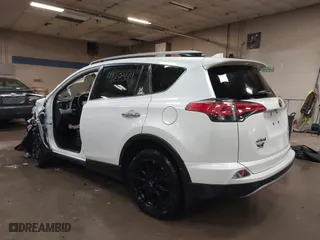 2018 Toyota RAV4 Limited with VIN JTMDFREV6JJ186499, listed as a IAAI auction lot 41668544 with 130,336 mi miles. Bid and sale history available at carsss.com. Image 3.