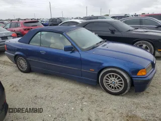 1999 BMW 3 Series 323icA with VIN WBABJ8333XEM23157, listed as a Copart auction lot 74237224 with 0 mi miles and Salvage Title. Bid and sale history available at carsss.com. Image 4.