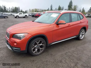 2014 BMW X1 xDrive28i with VIN WBAVL1C56EVY19385, listed as a IAAI auction lot 41997290 with 86,549 mi miles. Bid and sale history available at carsss.com. Image 2.