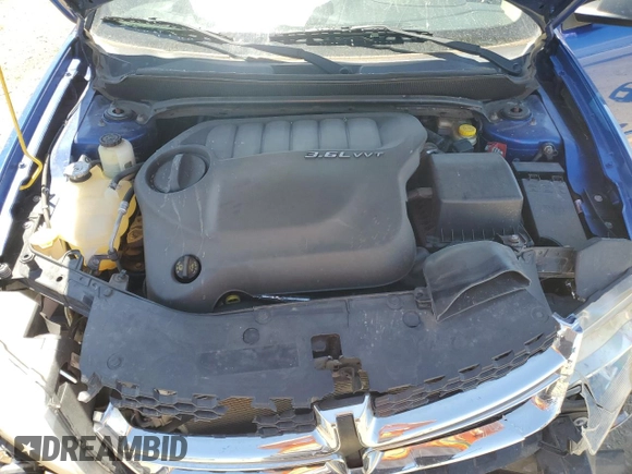 2012 Dodge Avenger SE with VIN 1C3CDZAG8CN327579, listed as a Copart auction lot 53384145 with 123,356 mi miles and Salvage Title. Bid and sale history available at DreamBid. Image 12.