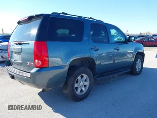 2009 GMC Yukon SLT 4SB with VIN 1GKFK33049R248055, listed as a IAAI auction lot 40756058 with 163,477 mi miles and . Bid and sale history available at DreamBid. Image 4.