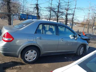 2007 Nissan Versa 1.8 S with VIN 3N1BC11EX7L404939, listed as a IAAI auction lot 41753426 with 163,944 mi miles. Bid and sale history available at carsss.com. Image 13.