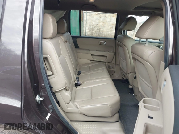 2013 Honda Pilot EX-L with VIN 5FNYF4H76DB016821, listed as a IAAI auction lot 41477343 with 129,689 mi miles and . Bid and sale history available at DreamBid. Image 8.
