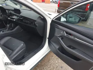 2023 Mazda 3 S Premium with VIN 3MZBPBDM6PM371326, listed as a IAAI auction lot 42138373 with 24,865 mi miles and . Bid and sale history available at DreamBid. Image 5.