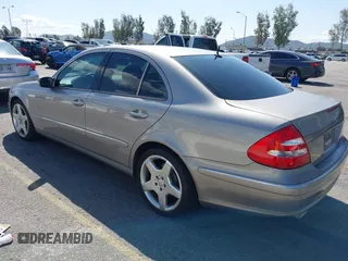 2003 Mercedes-Benz E-Class 3.2L with VIN WDBUF65J63X103423, listed as a IAAI auction lot 41937358 with 151,439 mi miles. Bid and sale history available at carsss.com. Image 3.