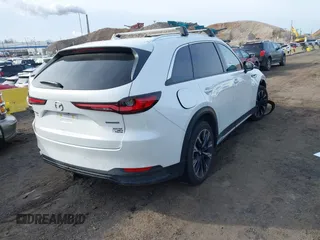 2024 Mazda CX-90 Premium with VIN JM3KKDHA2R1134742, listed as a IAAI auction lot 41575953 with 17,968 mi miles and . Bid and sale history available at DreamBid. Image 4.