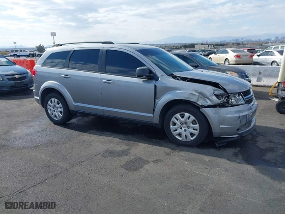 2016 Dodge Journey SE with VIN 3C4PDCAB0GT230512, listed as a IAAI auction lot 41434785 with 140,829 mi miles. Bid and sale history available at carsss.com. Image 1.