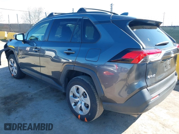 2019 Toyota RAV4 LE with VIN JTMG1RFV3KD025974, listed as a IAAI auction lot 41879264 with 131,933 mi miles and . Bid and sale history available at DreamBid. Image 3.
