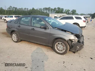 2006 Ford Focus S с VIN 1FAHP34N06W115926, выставлен на аукционе Copart как лот 59145555 с пробегом 263 717 миль миль и Списание • Salvage title. История ставок и продаж доступна на DreamBid. Изображение 4.