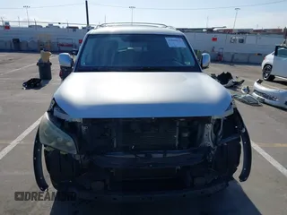 2012 Infiniti QX56 7-passenger with VIN JN8AZ2NF9C9517238, listed as a IAAI auction lot 42040522 with 165,088 mi miles. Bid and sale history available at carsss.com. Image 13.