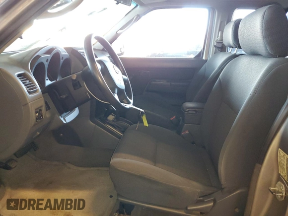 2003 Nissan Frontier XE z VIN 1N6ED26Y43C421206, wystawiony jako Copart lot #42264105 z przebiegiem 117 879 mil mil oraz Szkoda całkowita • Salvage title. Historia ofert i sprzedaży dostępna na DreamBid. Obrazek 7.